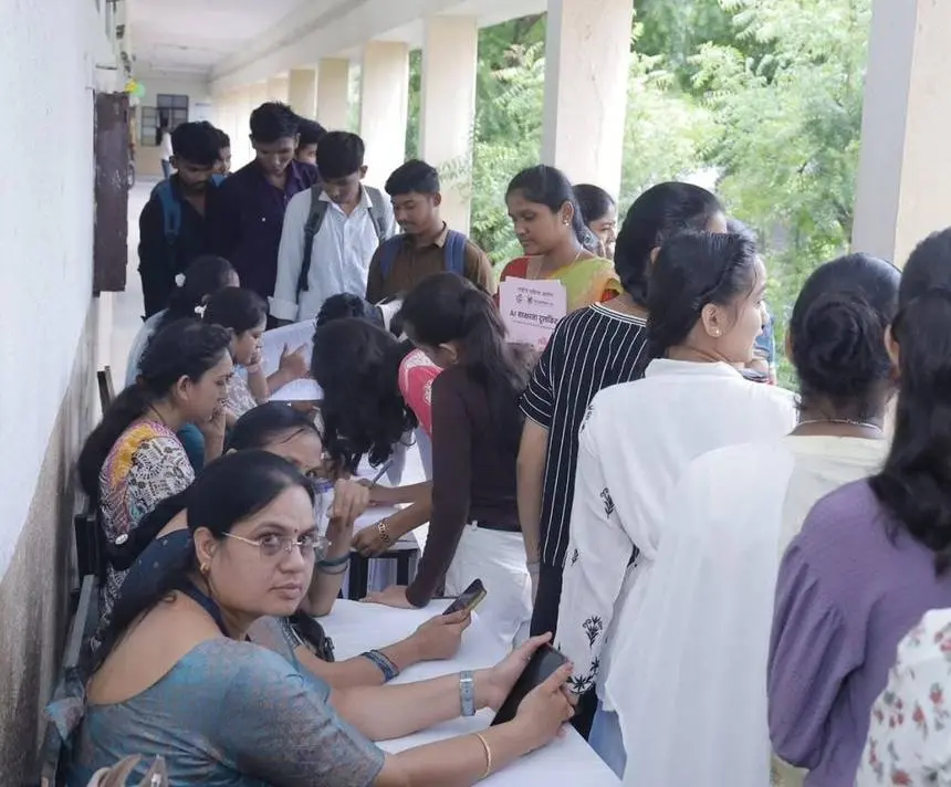 AI Literacy Toolkit distribution at the registration desk